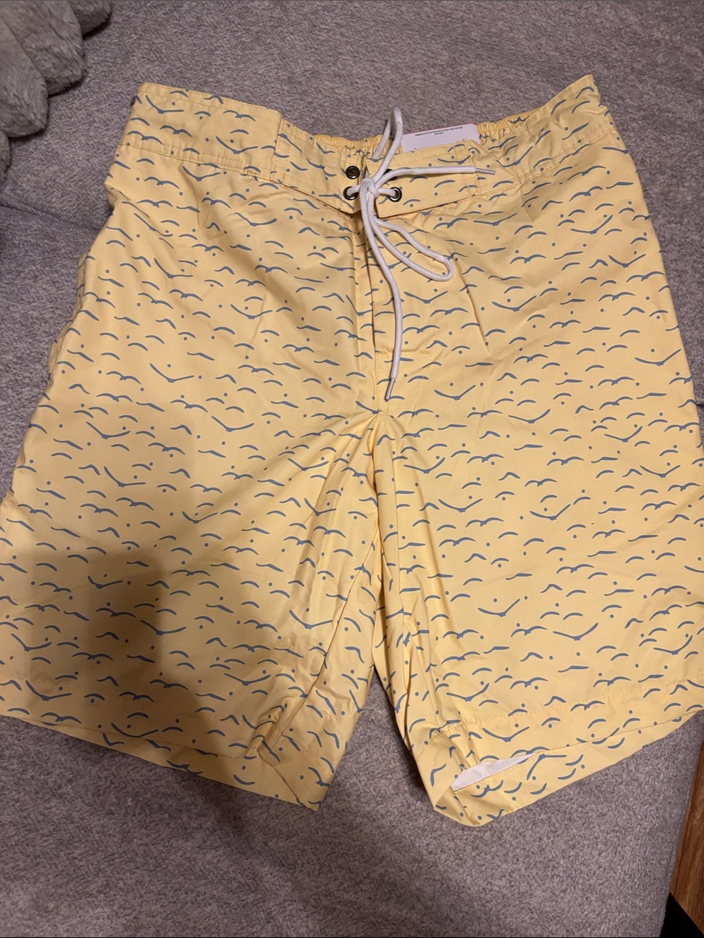 St. John's Bay Yellow Swim Shorts with Navy Wave Print